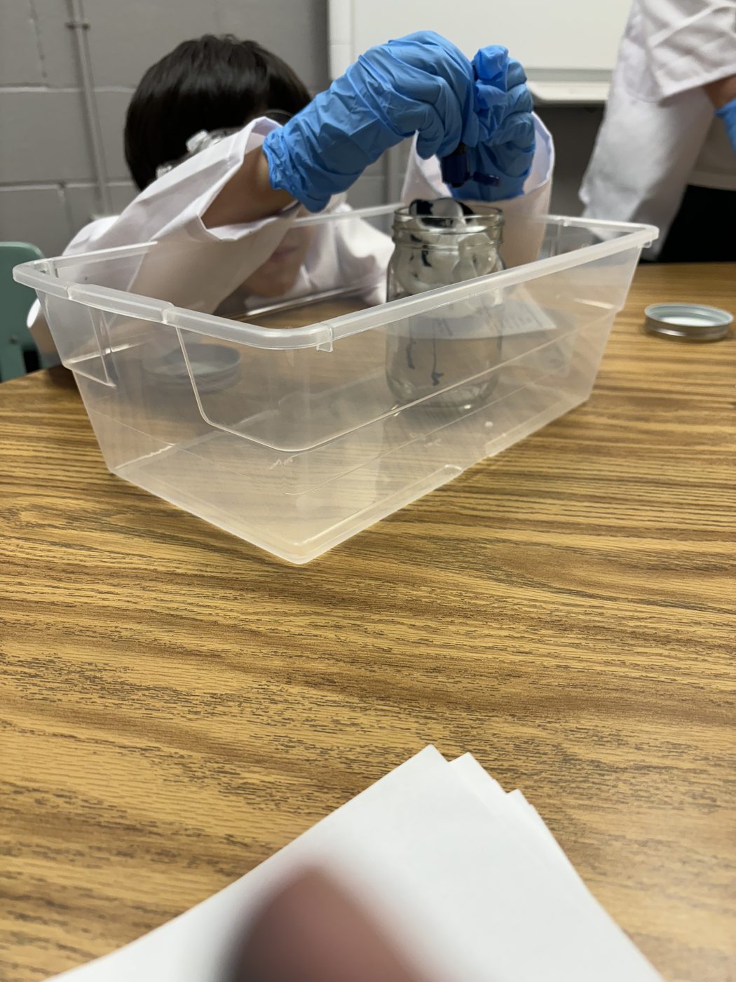 A hands-on sensory bin activity during a session